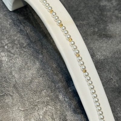 دستبند مرواریدی و پنج گوی البرنادو